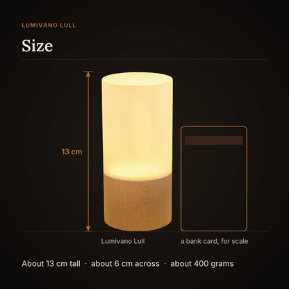 A size card on the dark brand ground: the night light drawn about 13 cm tall next to the outline of a bank card for scale, with a note that it is about 6 cm across and weighs about 400 grams.